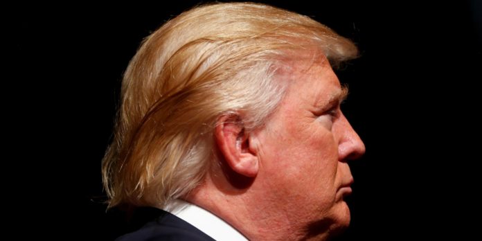 Republican U.S. Presidential nominee Donald Trump attends a campaign event at Briar Woods High School in Ashburn, Virginia
